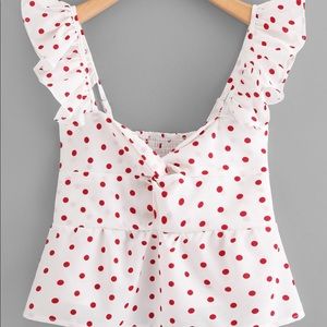 Twist front polka dot top